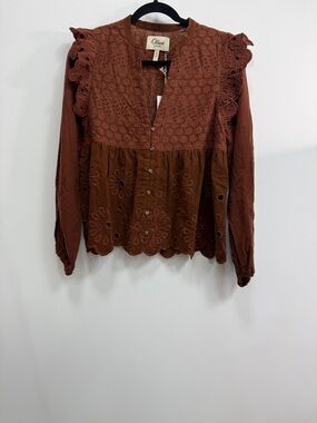 Ollari Women’s Rust Brown Eyelet Ruffle Peasant Top, NWT, size small.